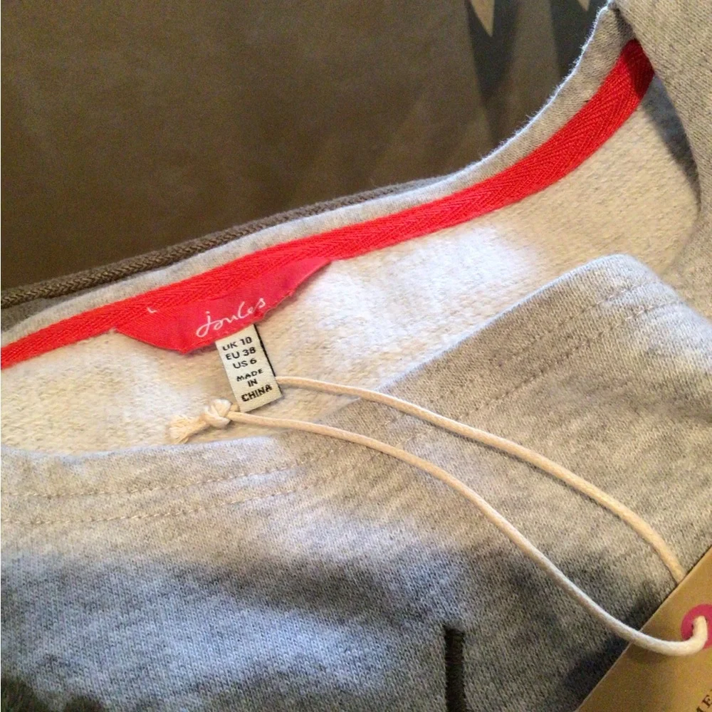 Joules sweatshirt with embroidered front and ruffle hem. - Picture 2 of 2